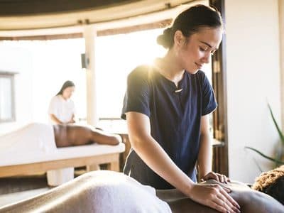 Massage therapist providing healing touch